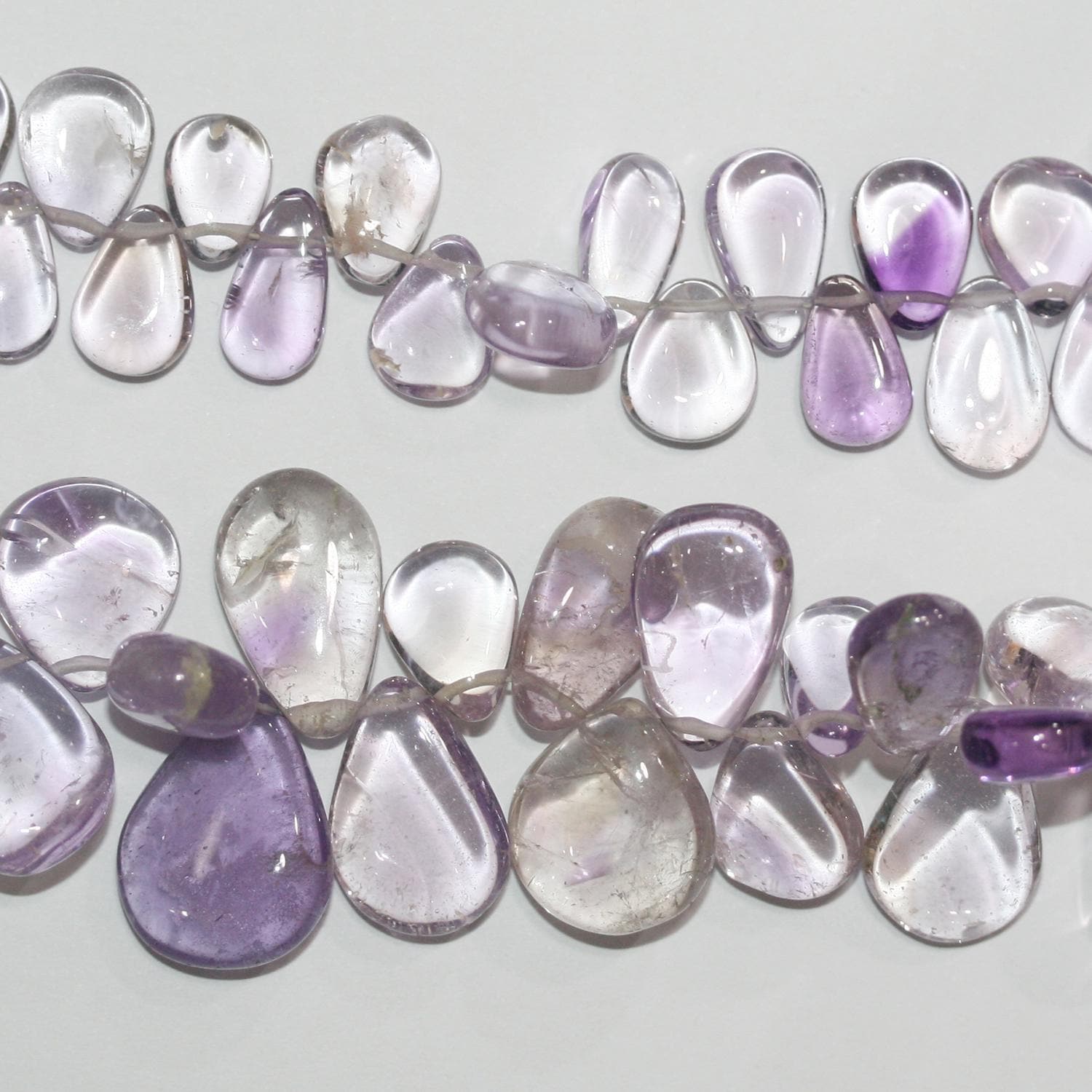 Cuentas de amatista de 8" (9 x 6-18 x 14 mm) con forma de gota lisa. Aprox. - Hilo de 22 cm.