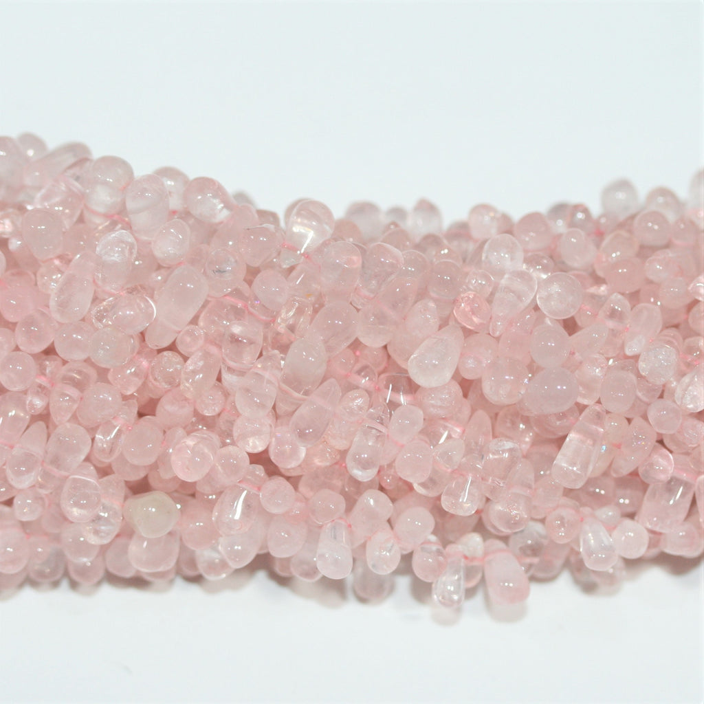 Perles en quartz rose lisses en forme de goutte, 10 x 5 mm environ - Longueur du fil : 36 cm.