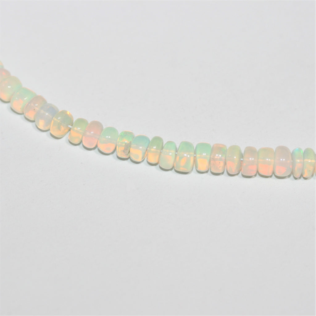 Cuentas redondas lisas graduadas de ópalo etíope de 16", 4 x 2 - 5,5 x 3 mm, tira de 40 cm.