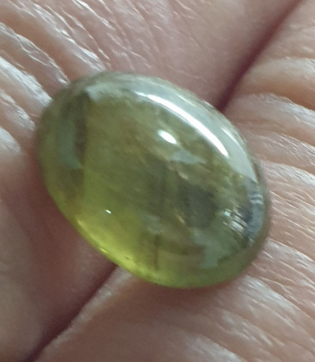 Green Sapphire Oval Cabochon 11.7x9mm.(5.7ct.).