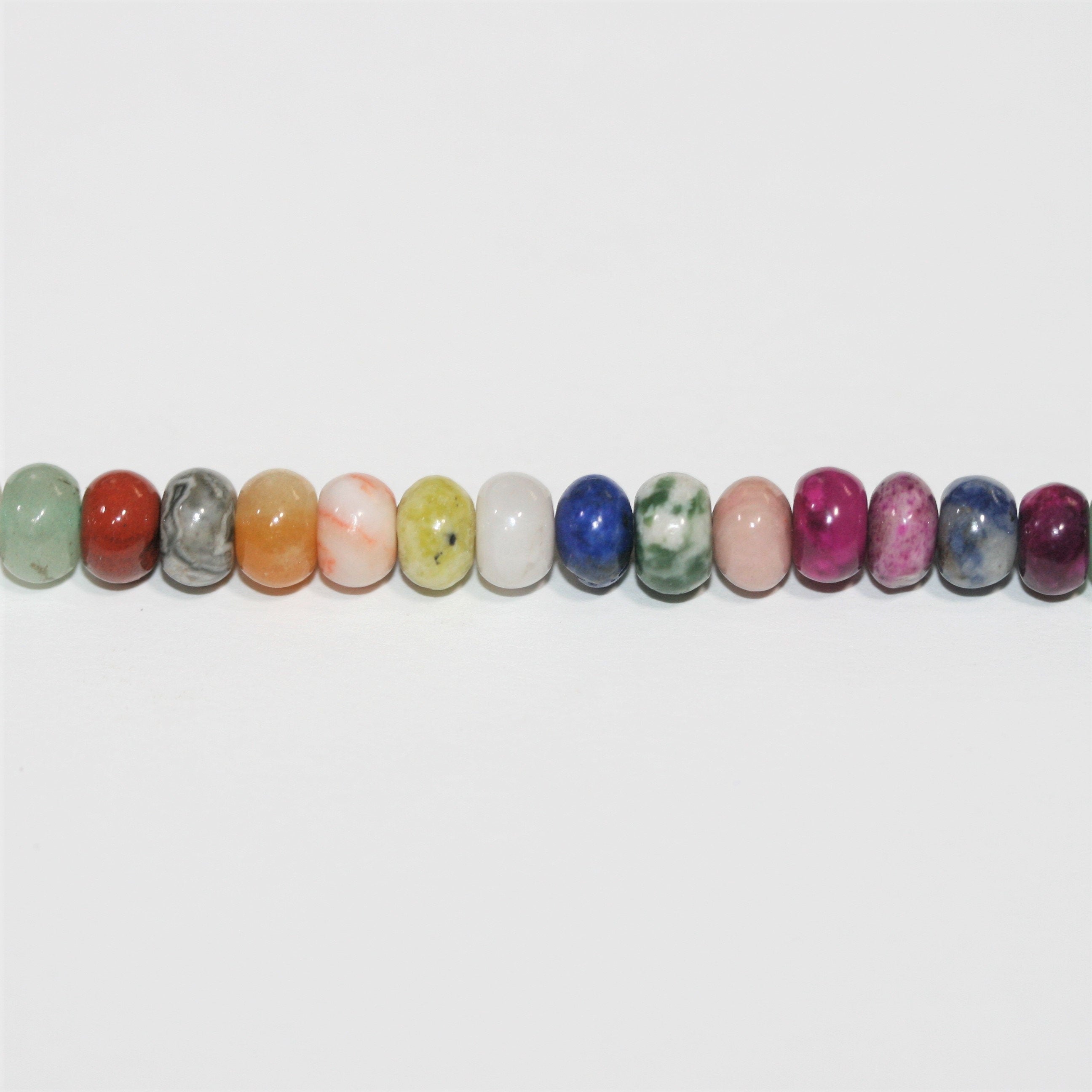 Perles rondelles lisses en pierre multicolore 15" 6x4mm.- Brin 38cm.