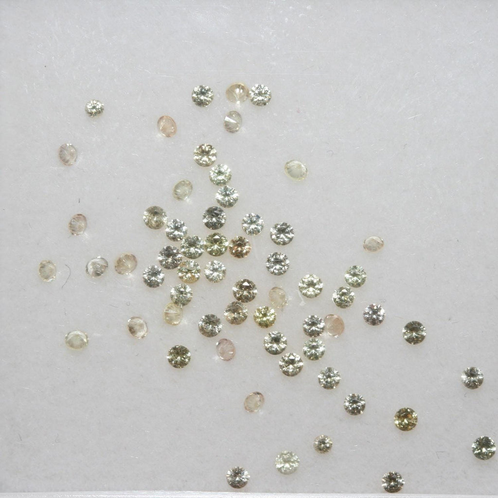 Lote de zafiro amarillo redondo facetado de 1,5 mm. Aprox. 1 quilate.