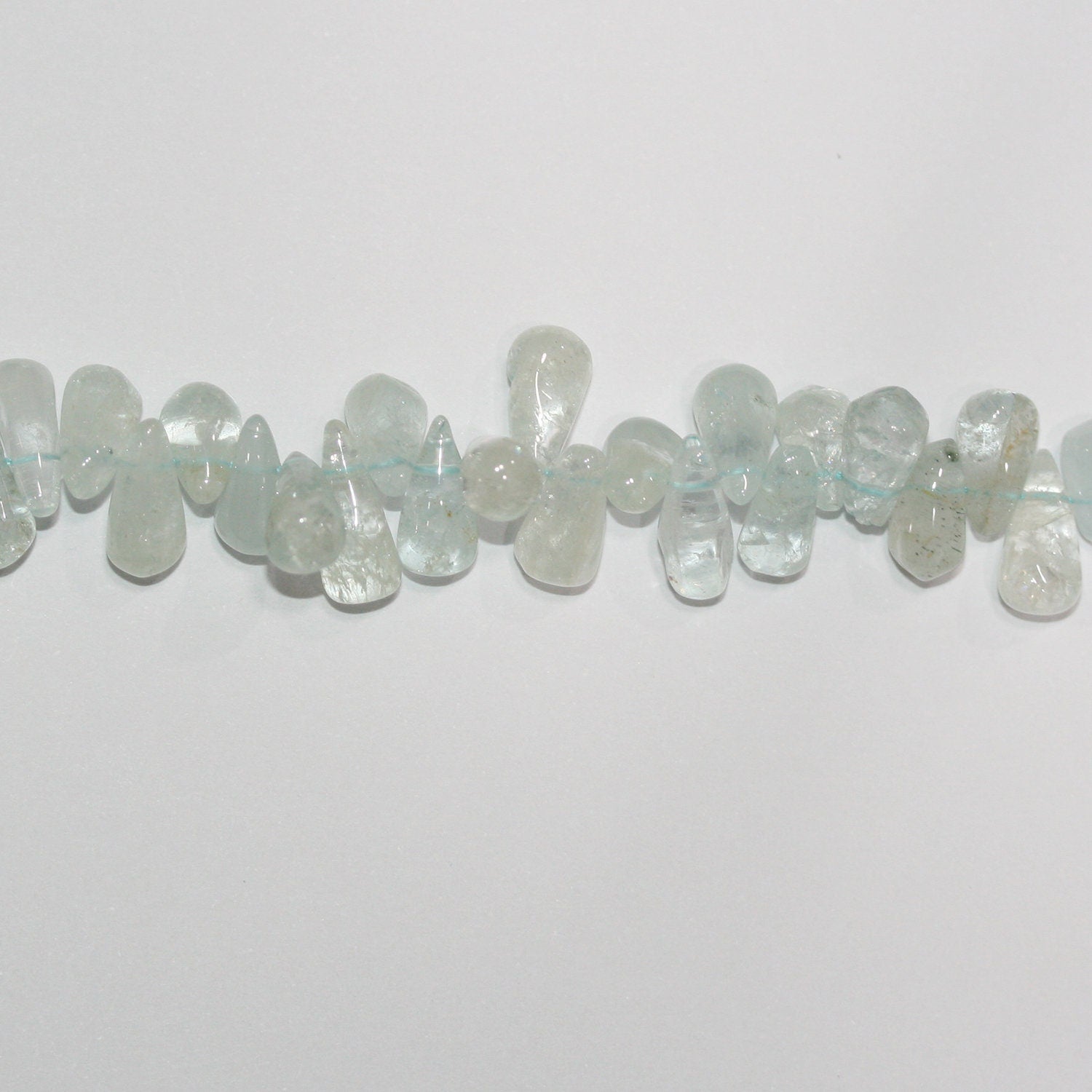 Cuentas lisas de aguamarina de 3" de largo, 8 x 5 mm. Aprox. - Hilo de 35 cm.