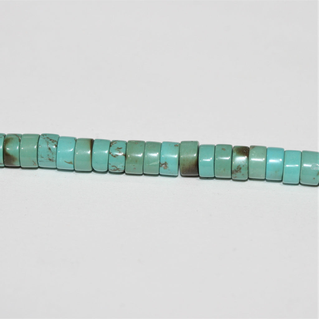 Perles rondelles lisses en turquoise St. 15" 6x3mm.- Brin 39cm.