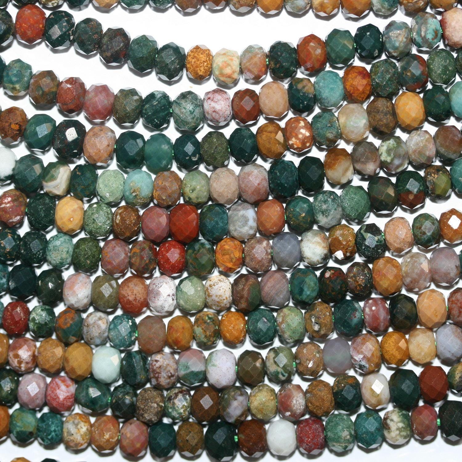 Perles rondelles à facettes en jaspe St Ocean 15" 6x4mm.-Rig 39cm.