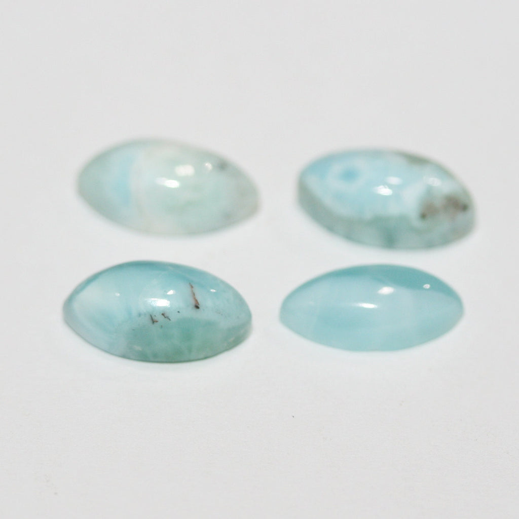 Lote de 4 cabujones de larimar marquesa de 14 x 7 mm. (4 piezas).
