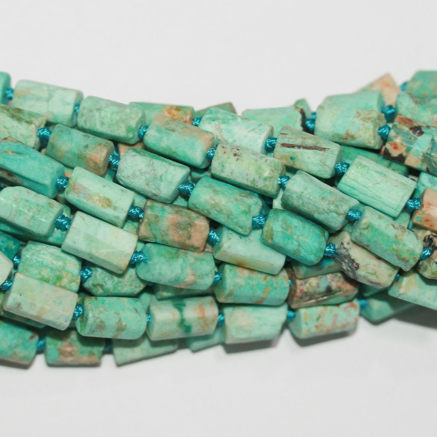 Perles cylindriques à facettes turquoise mates, 16 x 6 mm environ - Longueur du fil : 41 cm