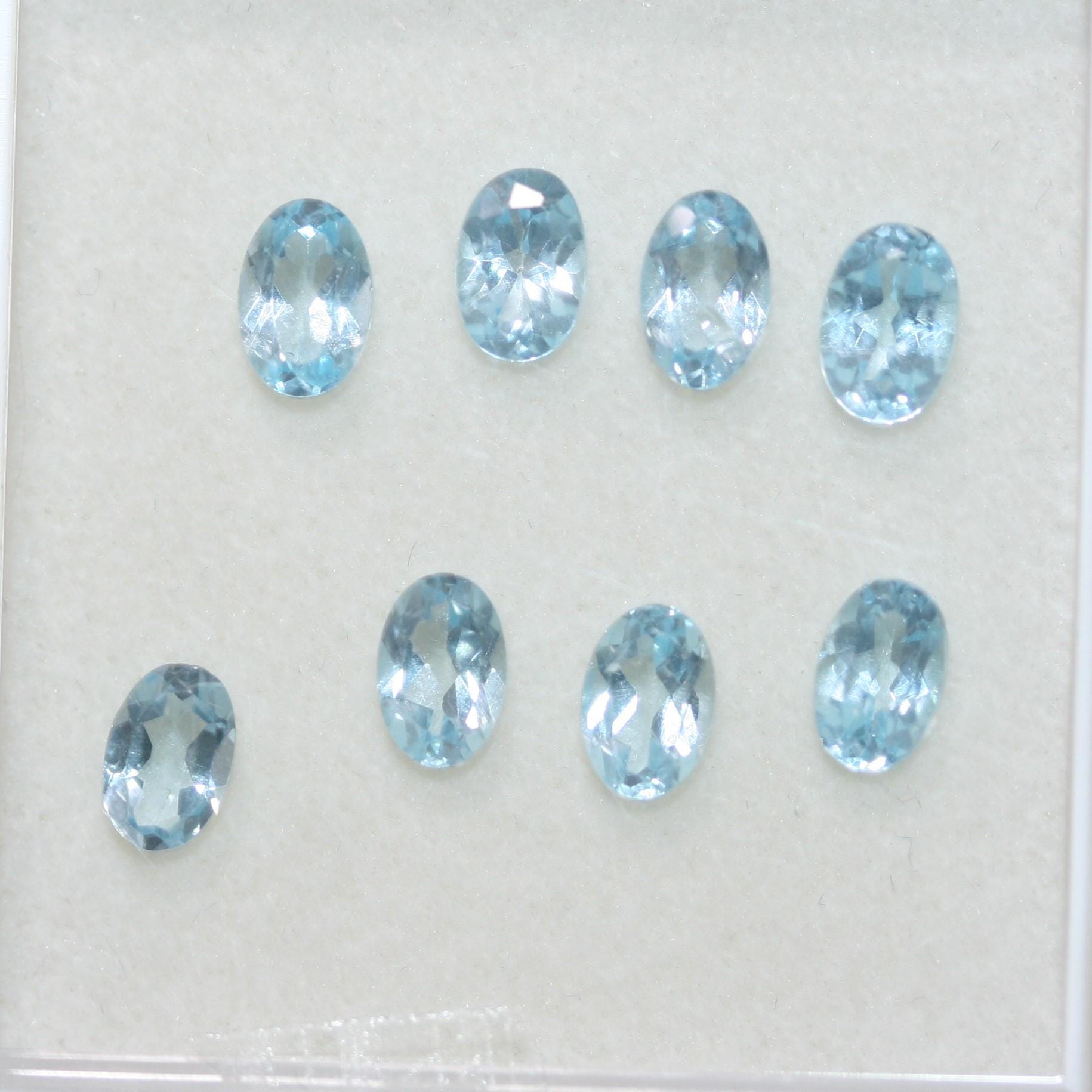 Lote de 8 topacios azul cielo facetados ovalados de 6 x 4 mm. (8 piezas).