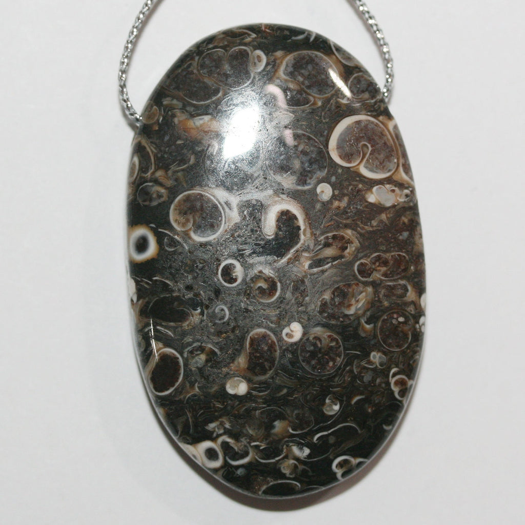 Colgante ovalado liso de ágata Turritella (45 x 25 mm aprox., 1 unidad)