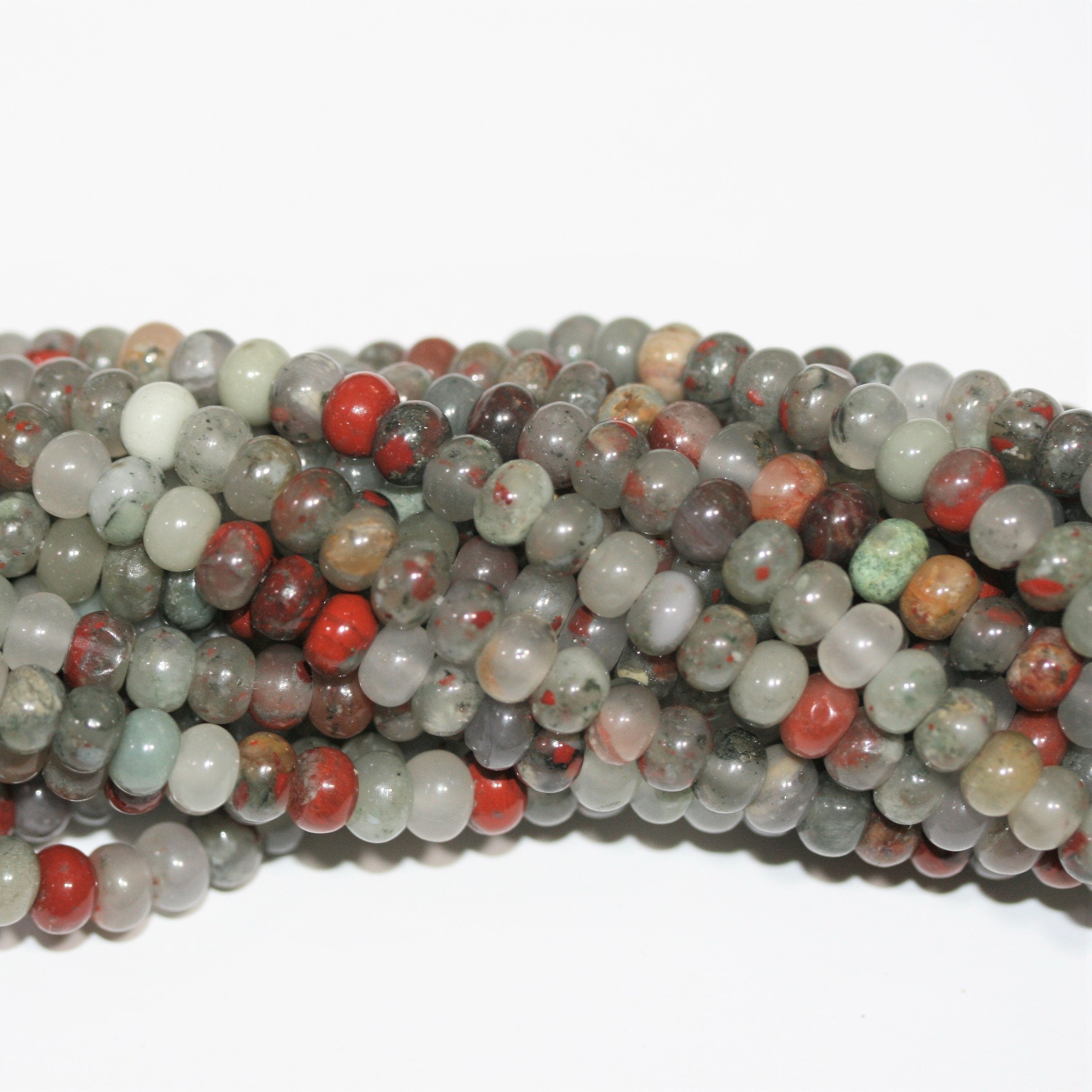 Perles rondelles lisses en héliotrope St 15" 6x4mm.- Brin 39cm.