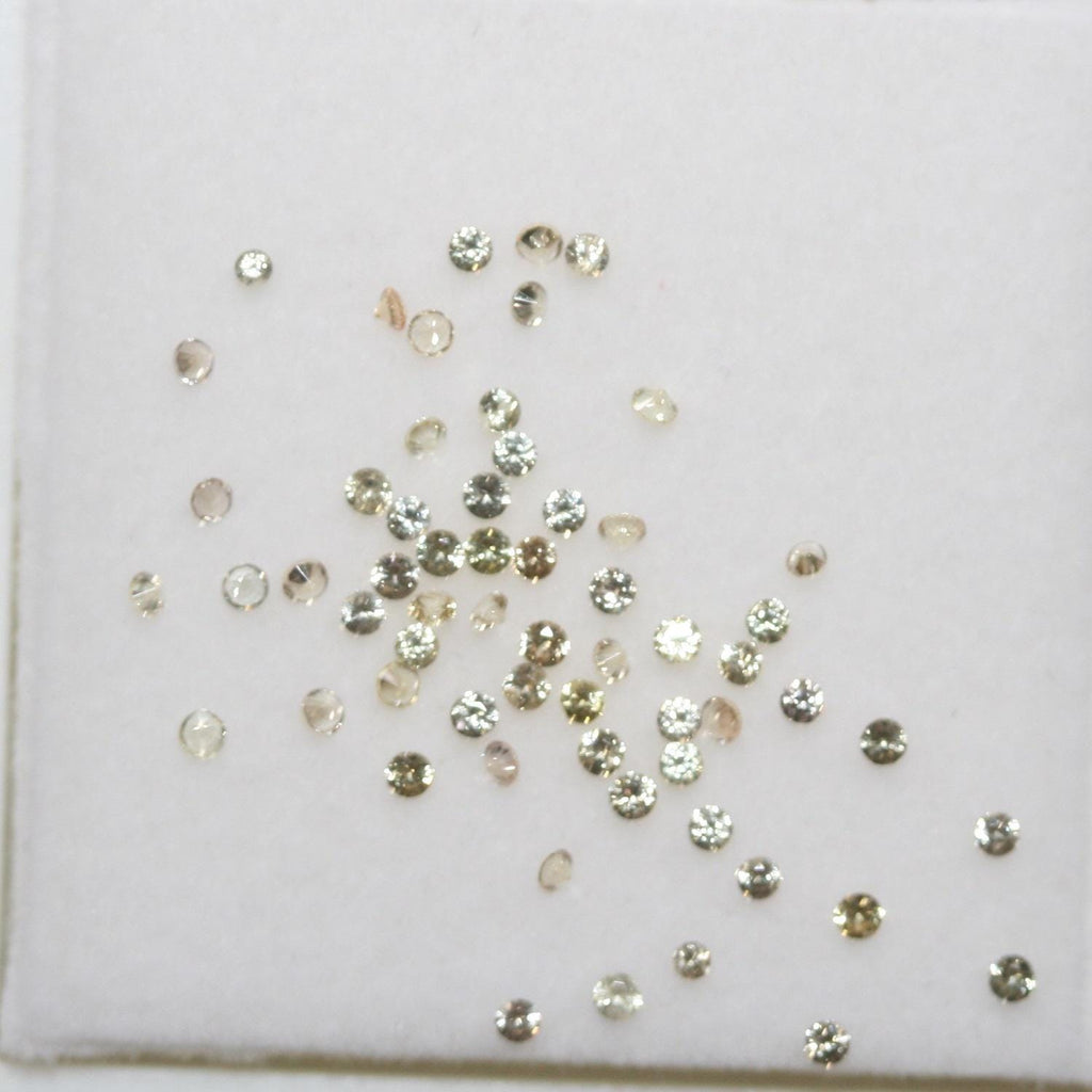 Lote de zafiro amarillo redondo facetado de 1,5 mm. Aprox. 1 quilate.