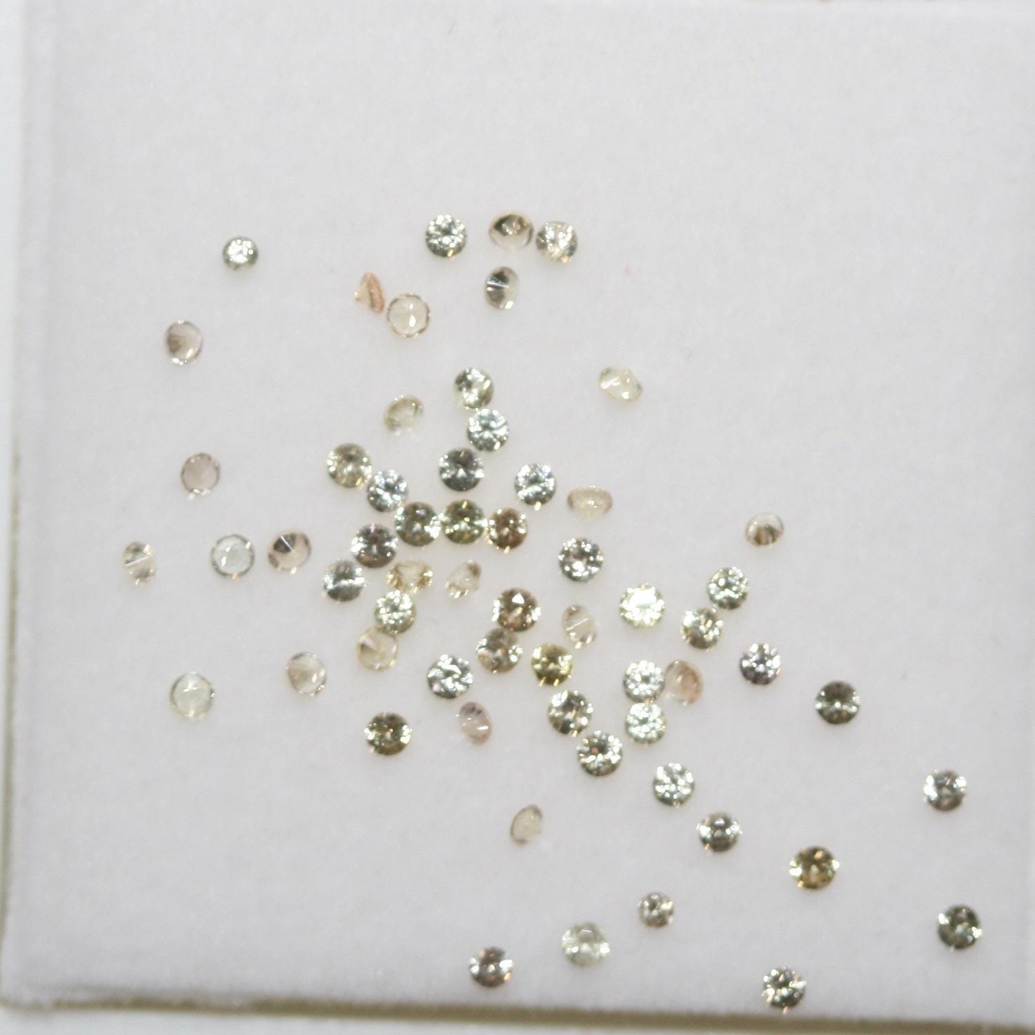 Lote de zafiro amarillo redondo facetado de 1,5 mm. Aprox. 1 quilate.