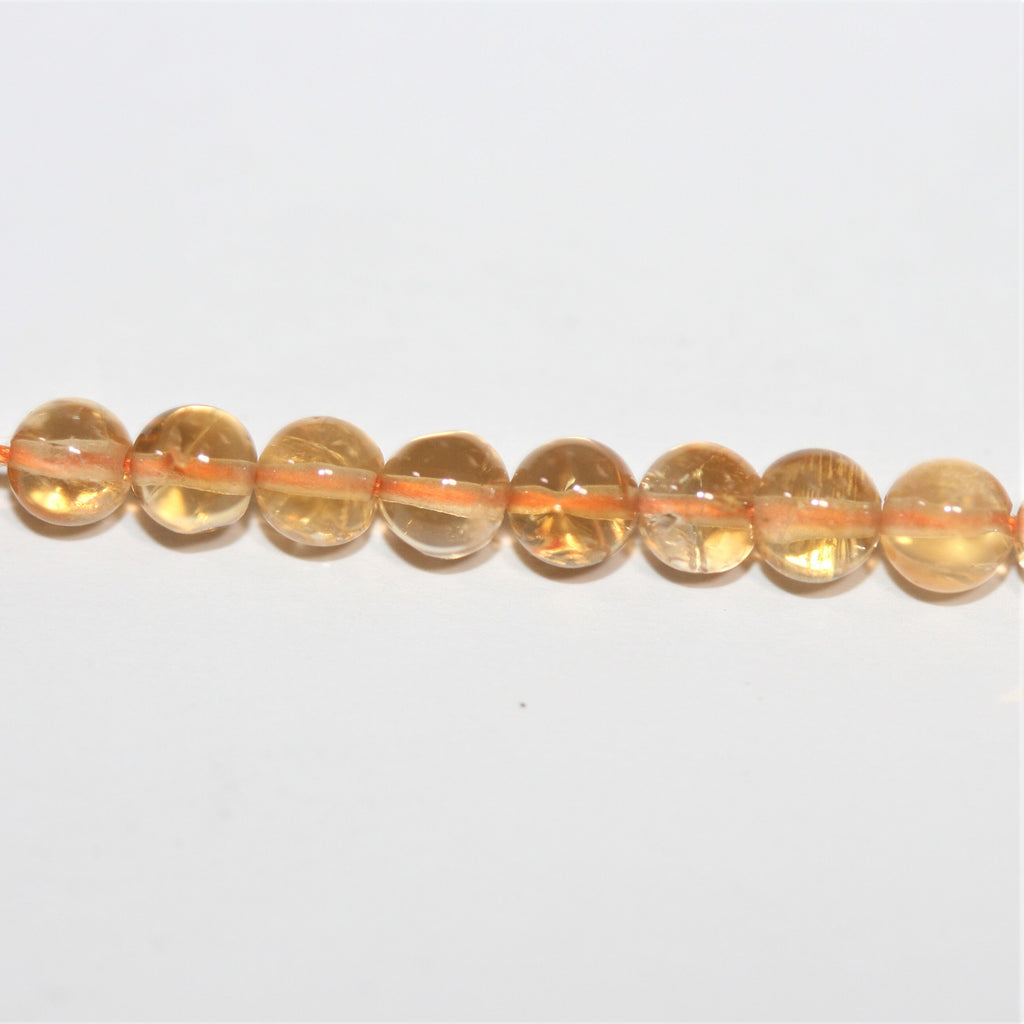 Perles rondes lisses de citrine 4 mm - Fil de 38 cm.