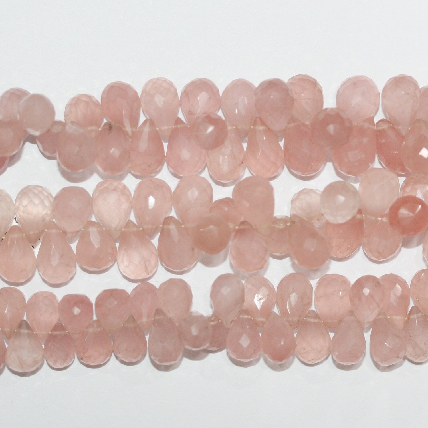 Perles en quartz rose facettées de 8 pouces (12 x 8 mm). Longueur du fil : environ 21 cm.