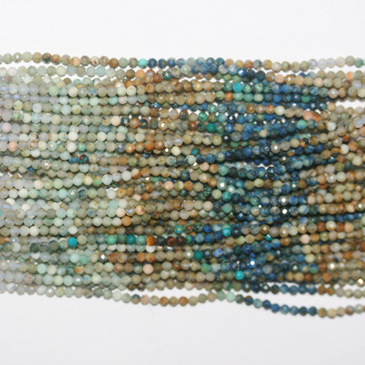 Cuentas redondas facetadas de Santa Crisocola de 16" y 2 mm. Tira de 40 cm.