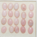 Lote de 20 cabujones ovalados de ópalo rosa de 7x5 mm. (20 uds.).