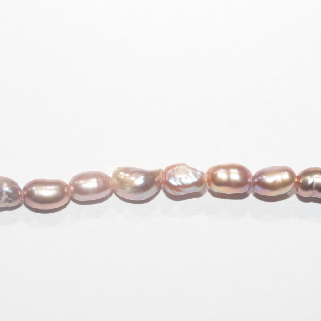 11" St FreshWater Salmon Oval Pearl Irregular Beads 6-7mm Approx.- Strand: 35cm.