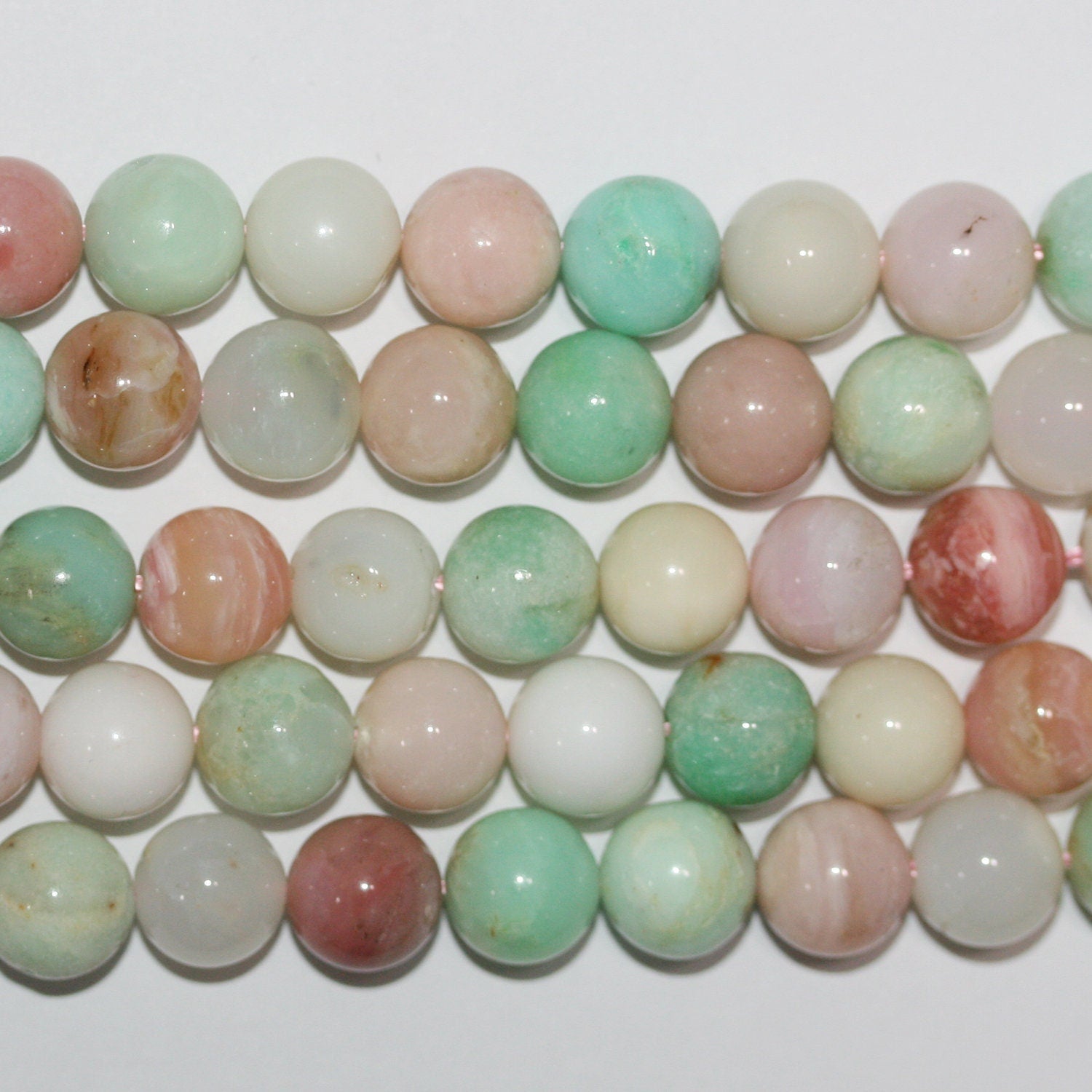 15" Sainte Chrysoprase - Perles rondes lisses en opale rose 12 mm - Fil de 39 cm.