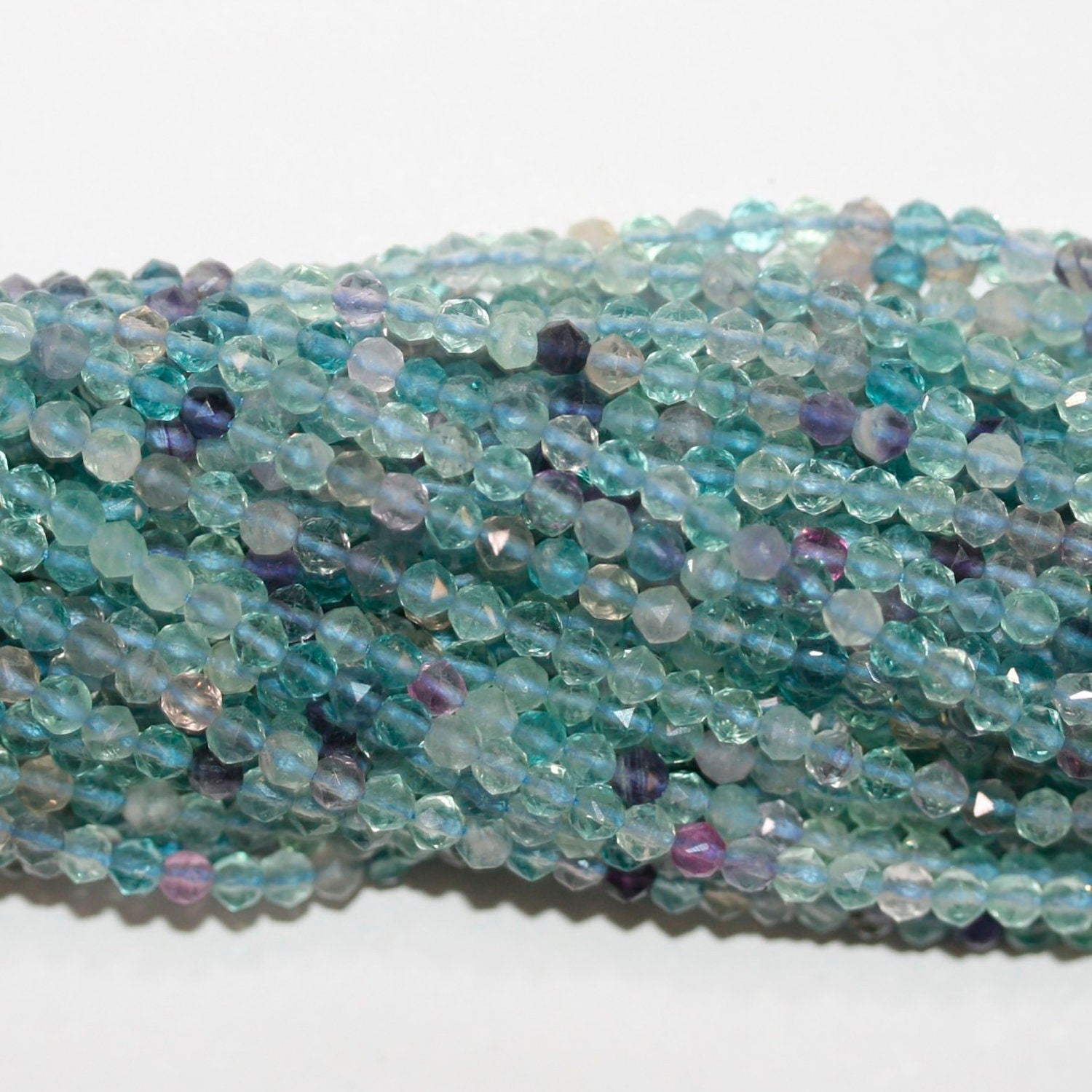 Cuentas redondas facetadas de fluorita de 4 mm (16") - Hilo de 40 cm