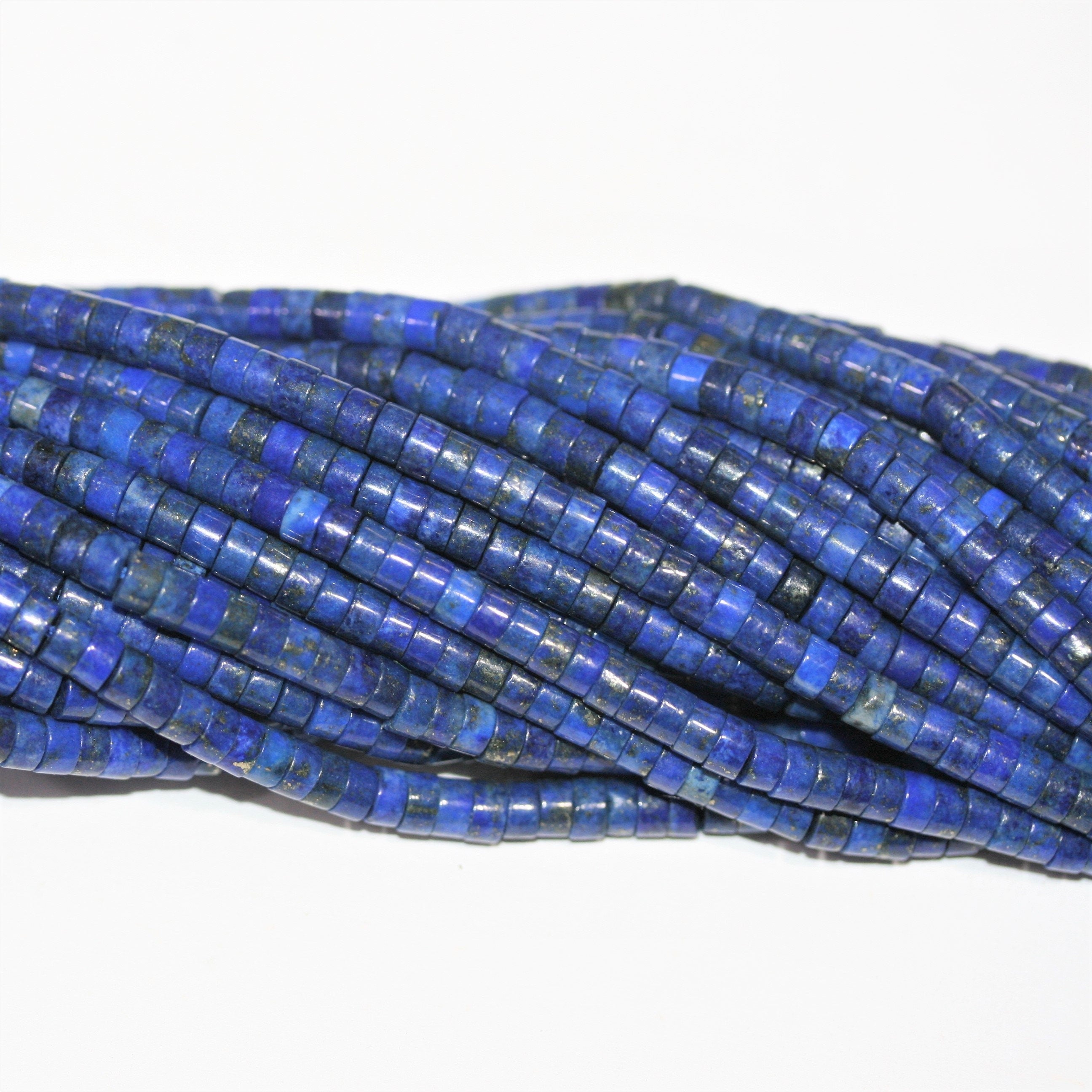 Perles disques lisses en lapis-lazuli de 15 pouces, 4 x 2 mm. - Brin de 39 cm.