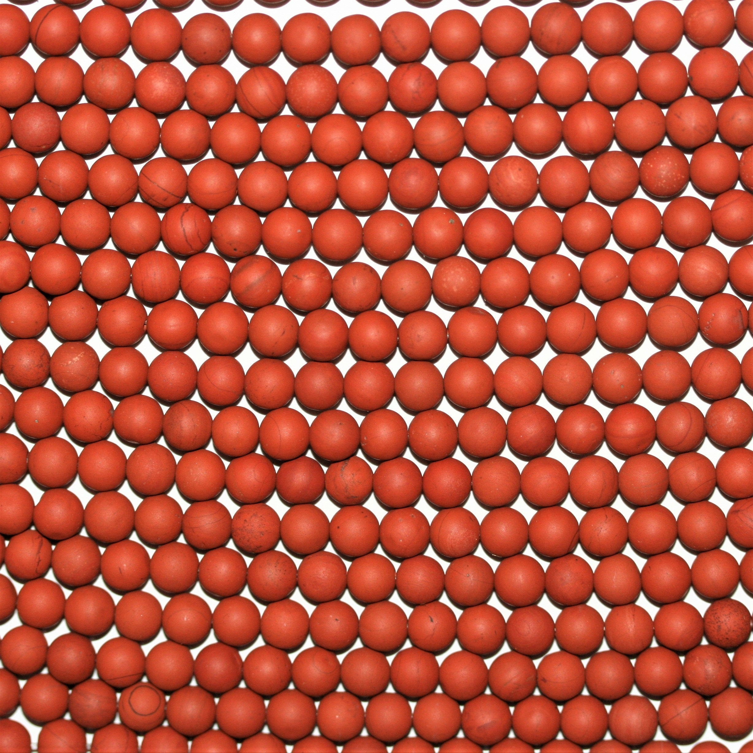 Perles rondes lisses en jaspe rouge, finition mate, 6 mm - Fil de 38 cm.