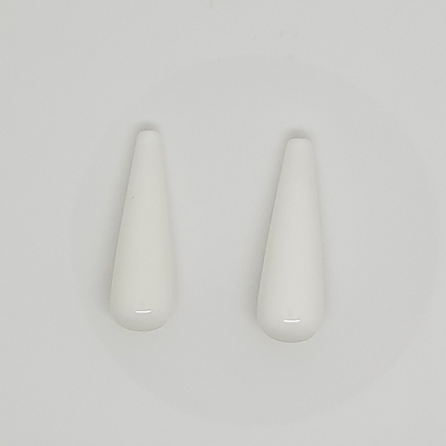 Ágata blanca semiperforada, gota lisa, 22 x 7 mm (1 par)