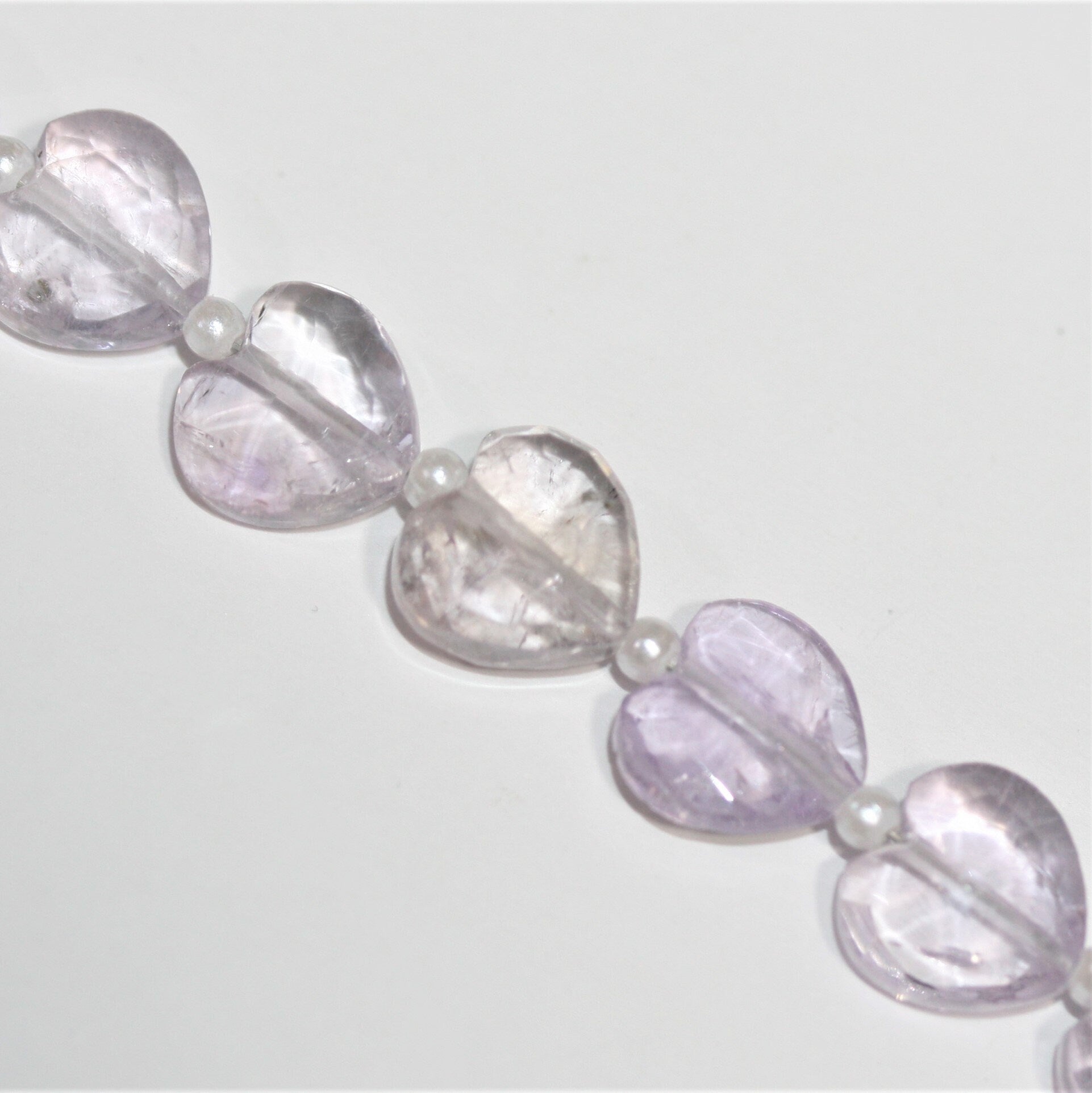 Cuentas de corazón facetadas de amatista Santa de 7" 8x10 mm - Hilo de 17 cm.