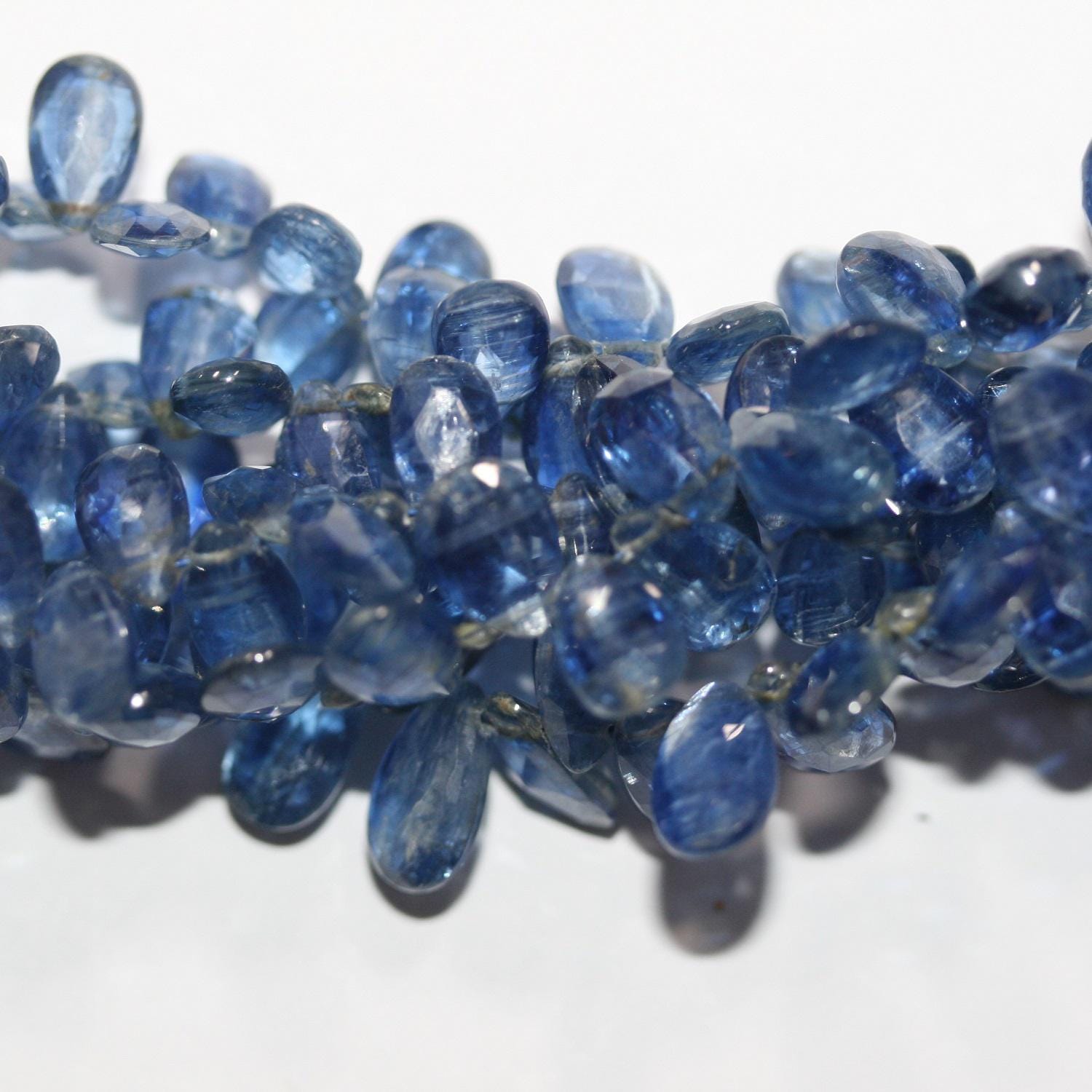 Perles en kyanite facettées de 20 cm (8 pouces), 9 x 6 mm environ - Longueur du fil : 20 cm