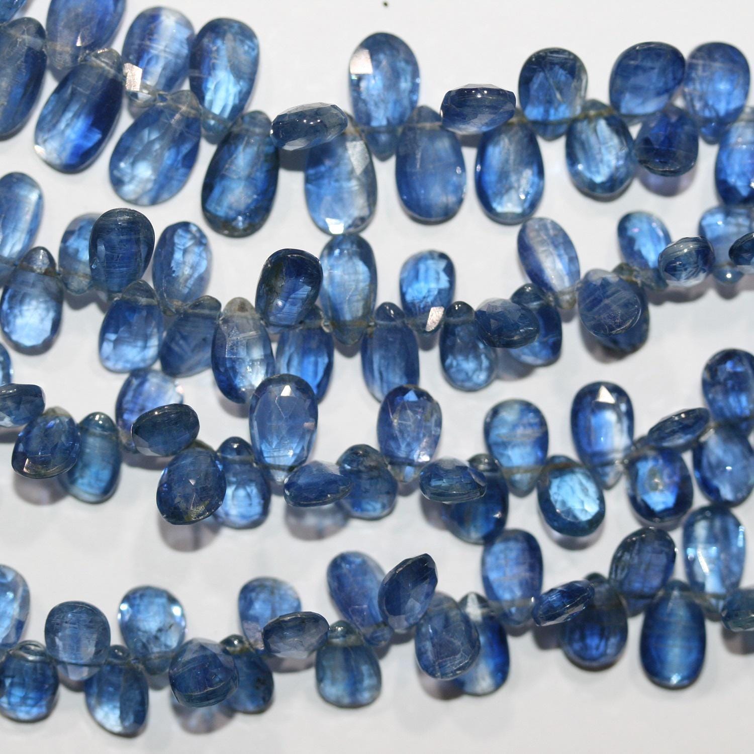 Perles en kyanite facettées de 20 cm (8 pouces), 9 x 6 mm environ - Longueur du fil : 20 cm
