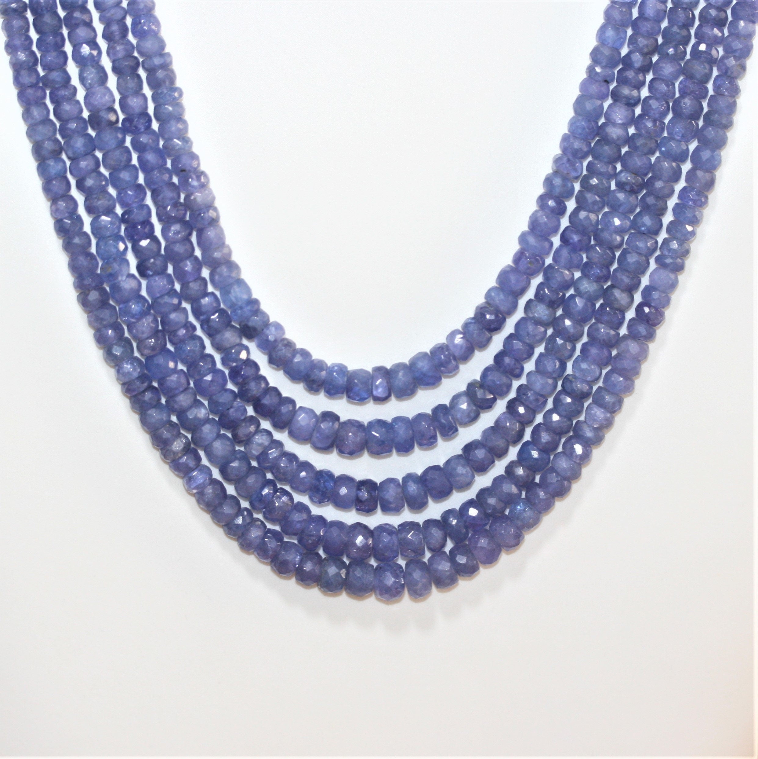 Collier de 5 rangs de rondelles à facettes dégradées en tanzanite (3 x 2 à 6 x 4 mm).