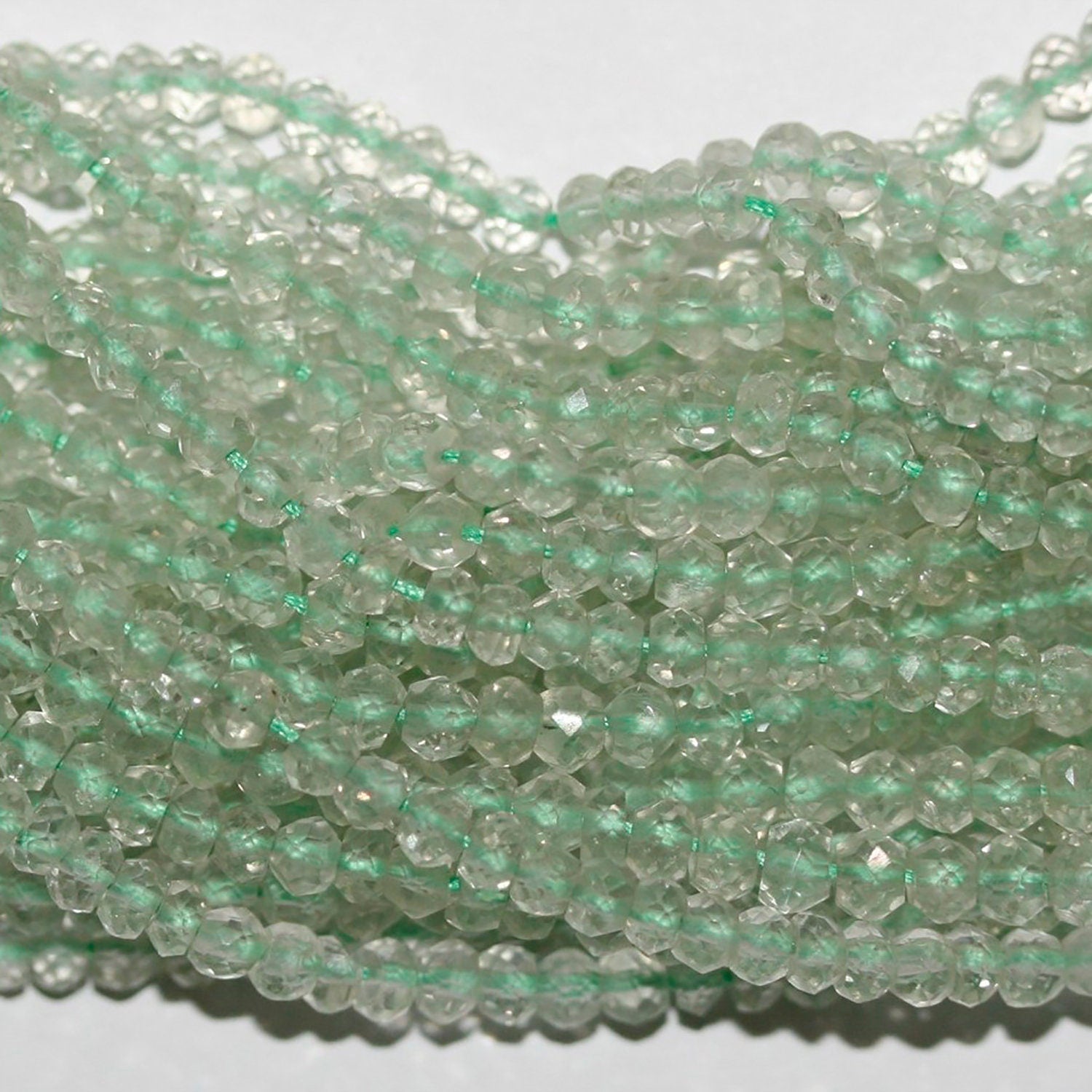 13" St Prasiolite  Faceted Rondelle Beads 3x2mm.-Strand 34cm