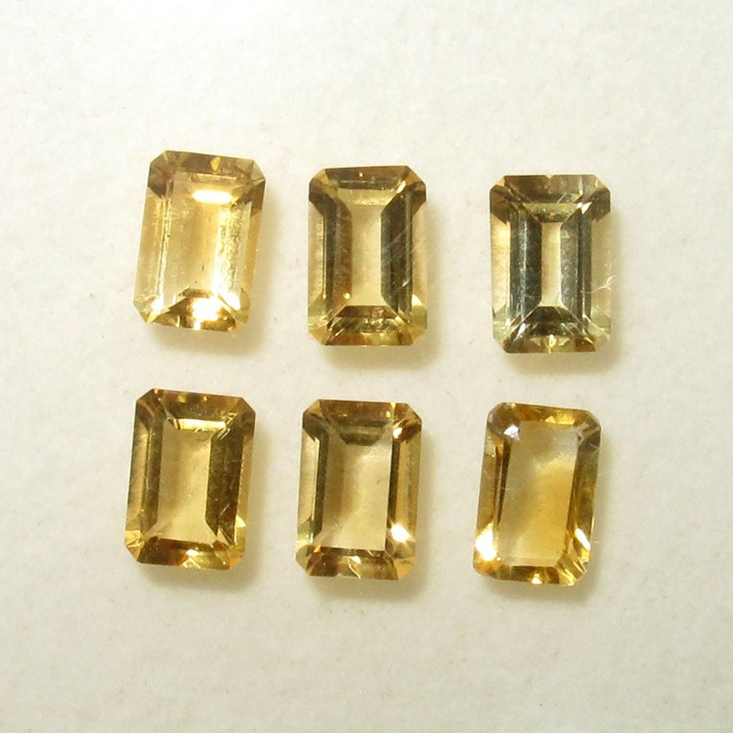 Lote de 6 piezas de Citrino Facetado Rectangular 6x4 mm. (6 uds.)