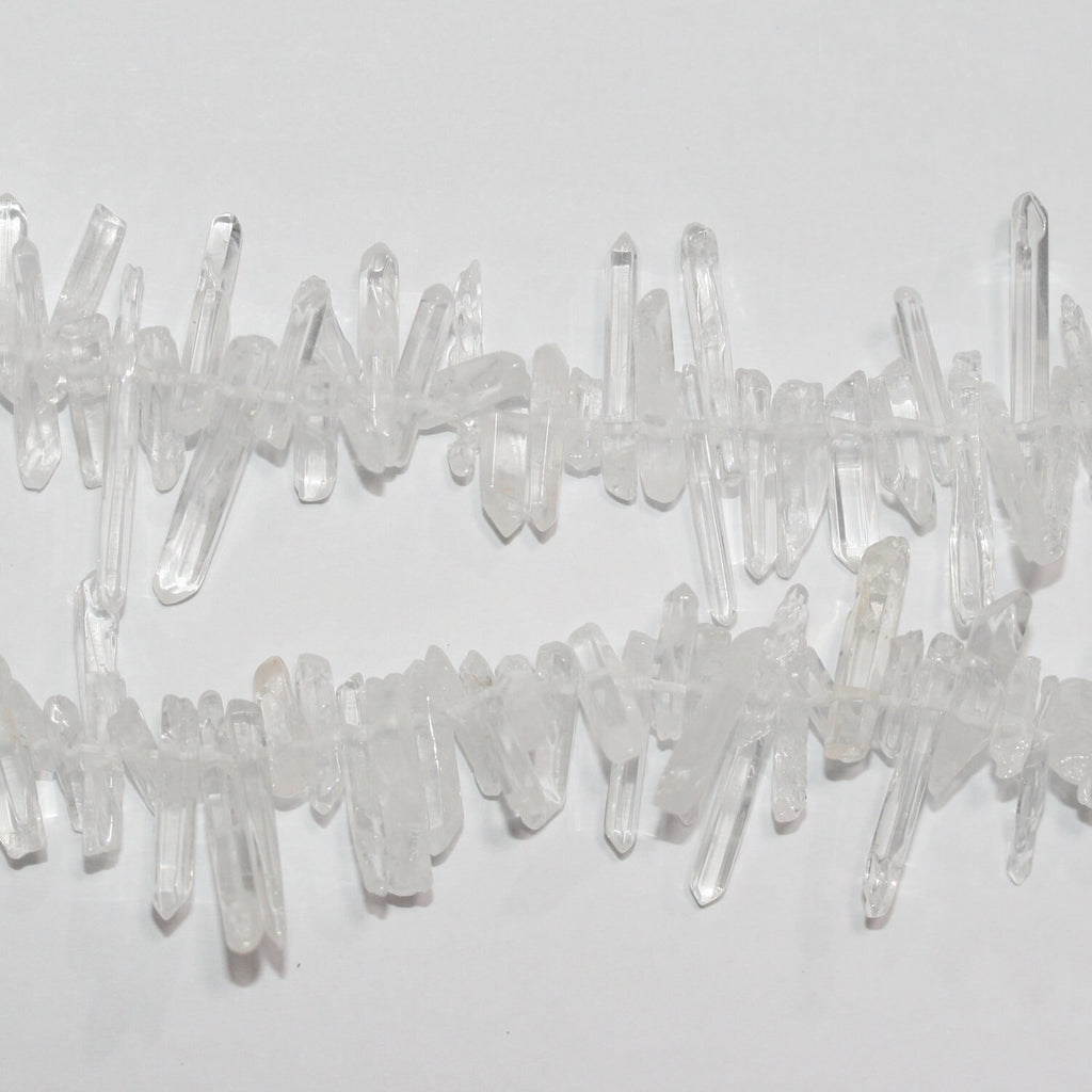 Perlas de cristal de roca de cuarzo sin pulir de 16", 25-18 x 5 mm, aprox., hilo de 40 cm.