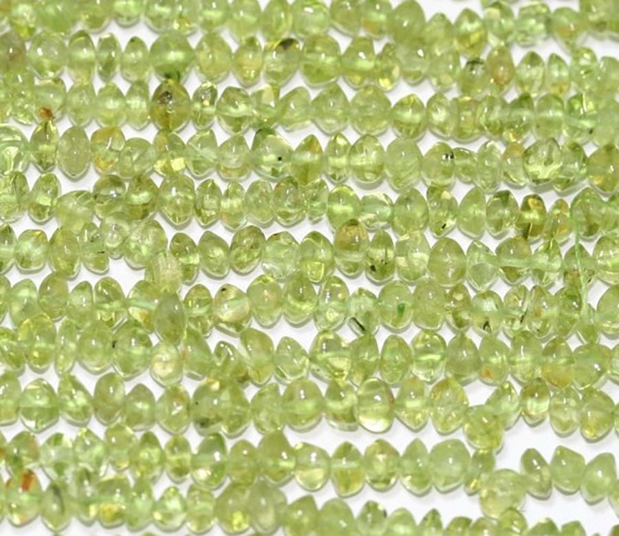 Perles rondelles lisses en péridot de 14 pouces, 4 x 3 mm. - Fil de 37 cm.