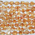 Perles de citrine facettées en forme de pépite, 15 pouces (10-13 mm). Longueur approximative du fil : 39 cm.