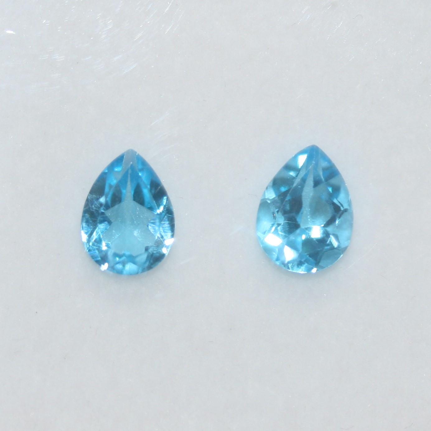 Lote de 2 piezas de topacio azul suizo facetado, 8 x 6 mm. (2 piezas)