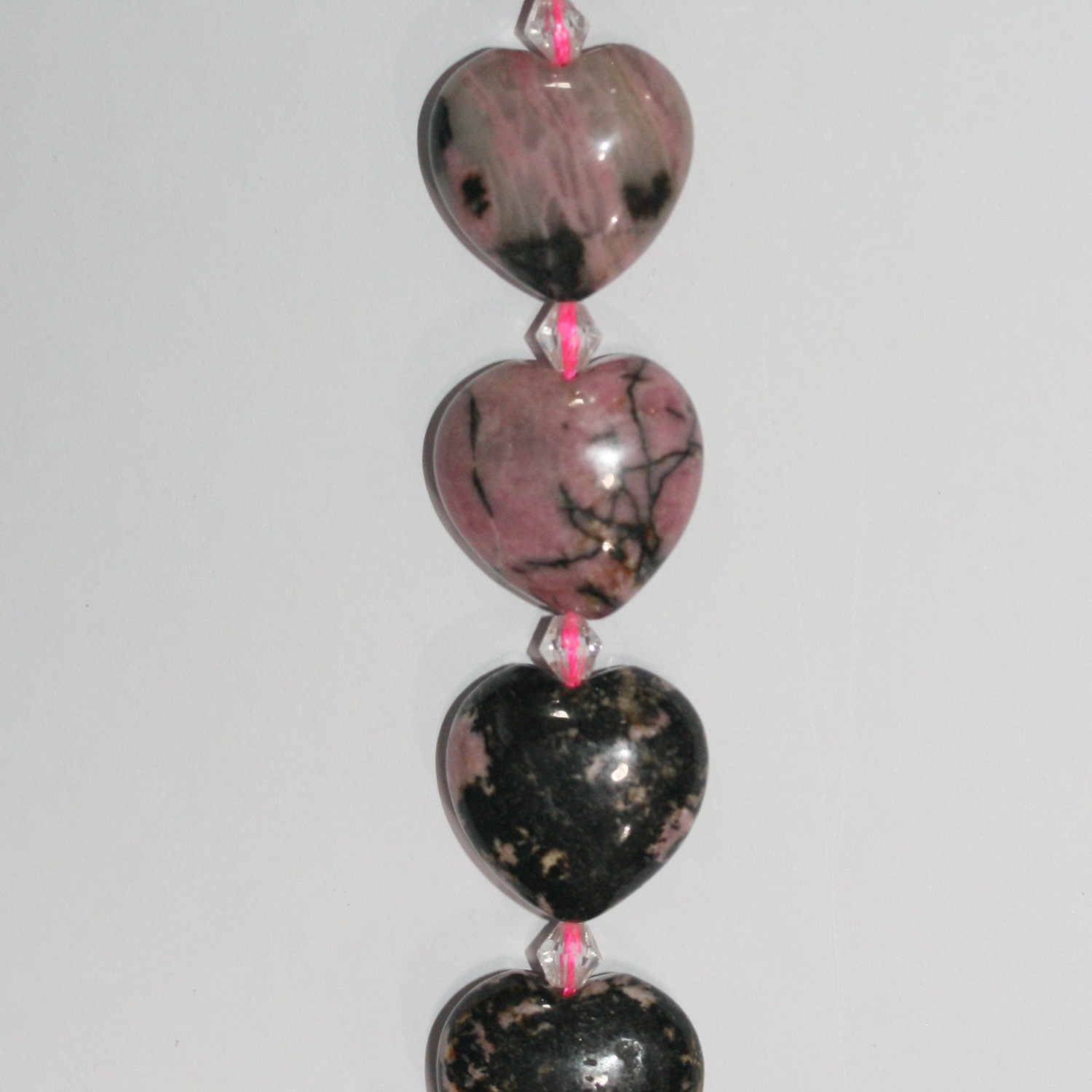 Cuentas de corazón lisas de rodonita de 16" (20 mm) - Hilo de 40 cm