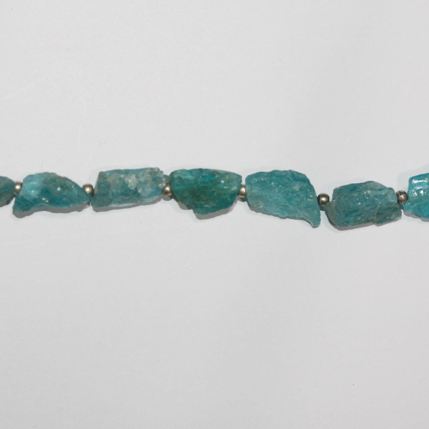 Cuentas de apatita azul sin pulir de 8" (11 x 5 mm, aprox. - Hilo de 20 cm)