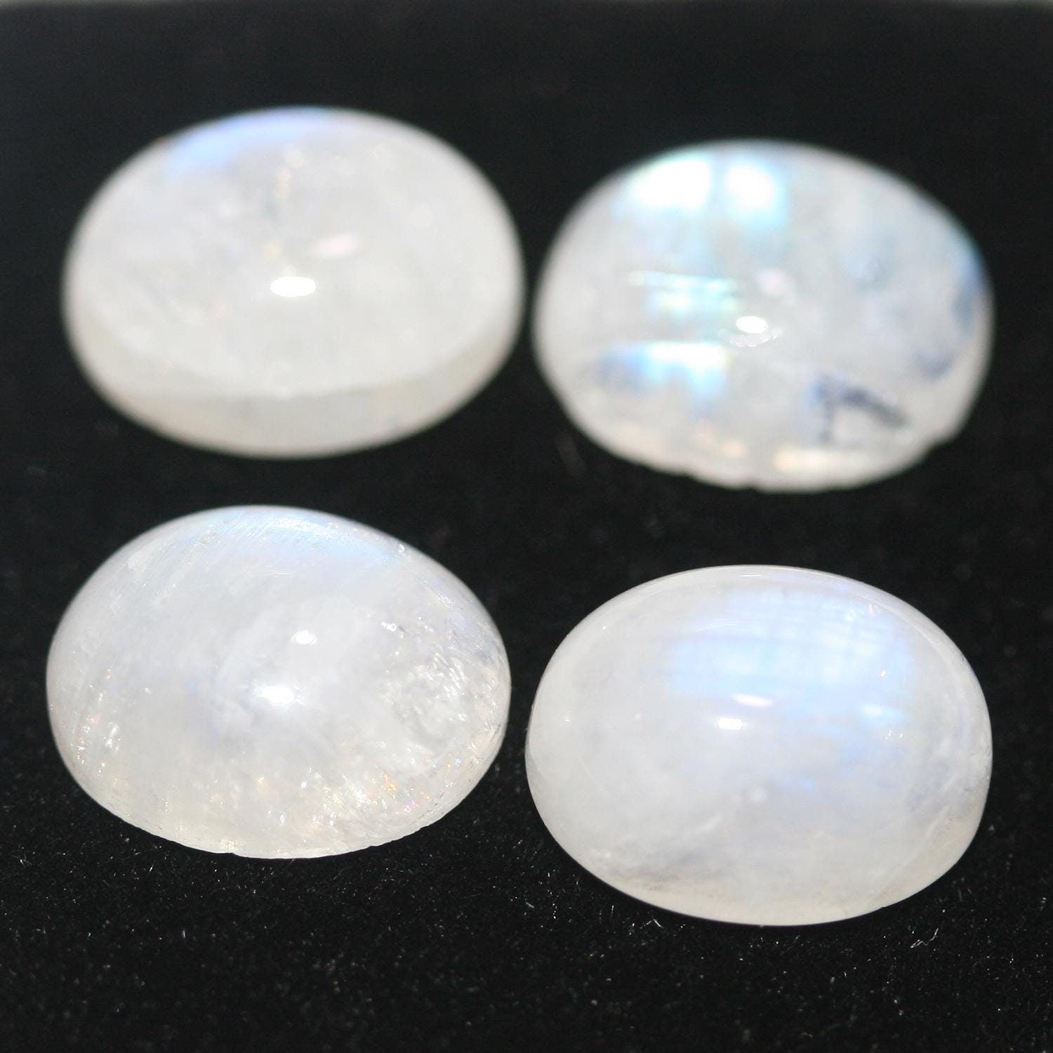 4 cabochons ovales lisses en pierre de lune 10x8mm.- (4 pièces)