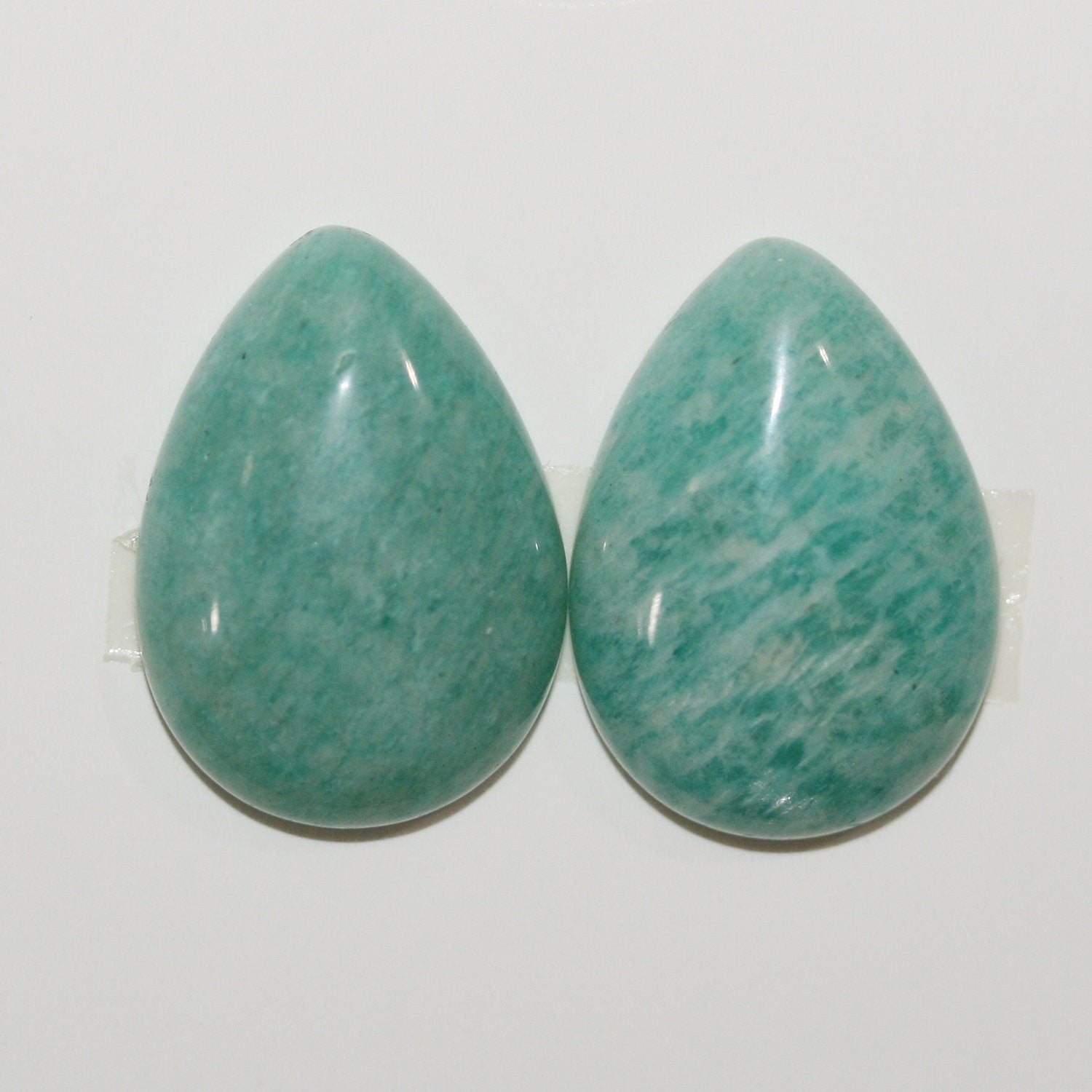 Lote de 2 cabujones de amazonita lisos de 25 x 18 mm. (2 piezas)