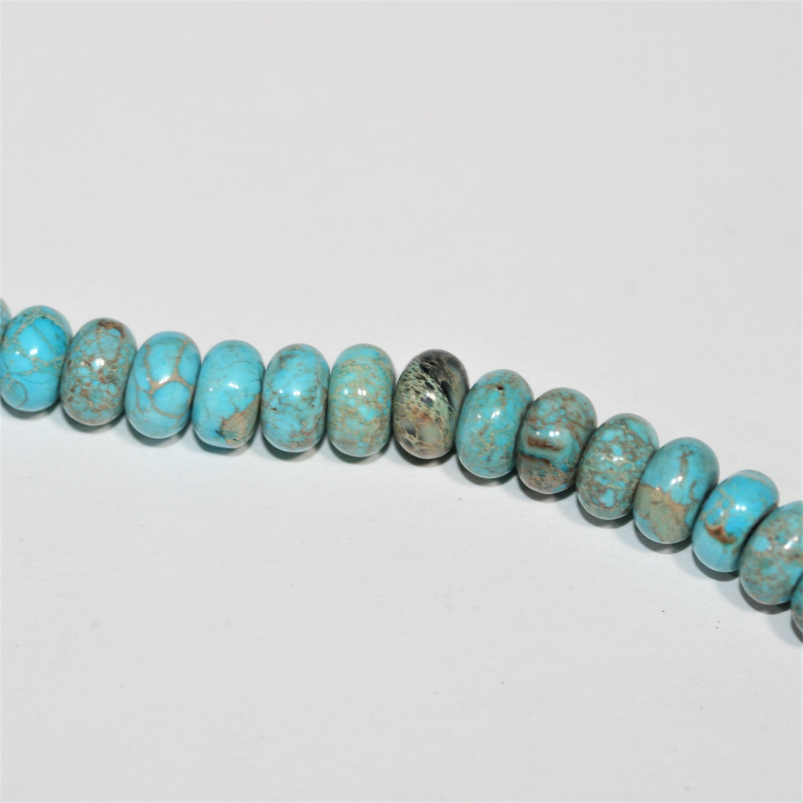 Cuentas redondas lisas de turquesa St. de 16" de 8 x 5 mm - Hilo de 40 cm.