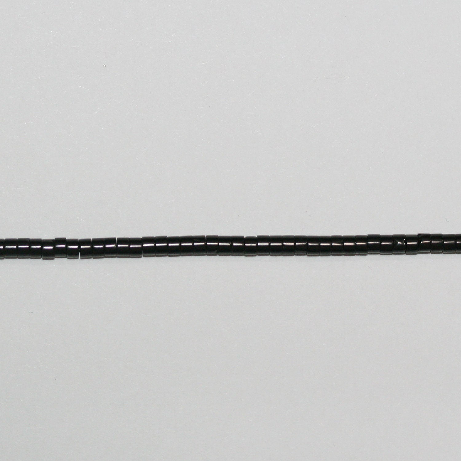 Perles disques lisses St Jet 15" 3x2mm.-Bracelet 39cm.