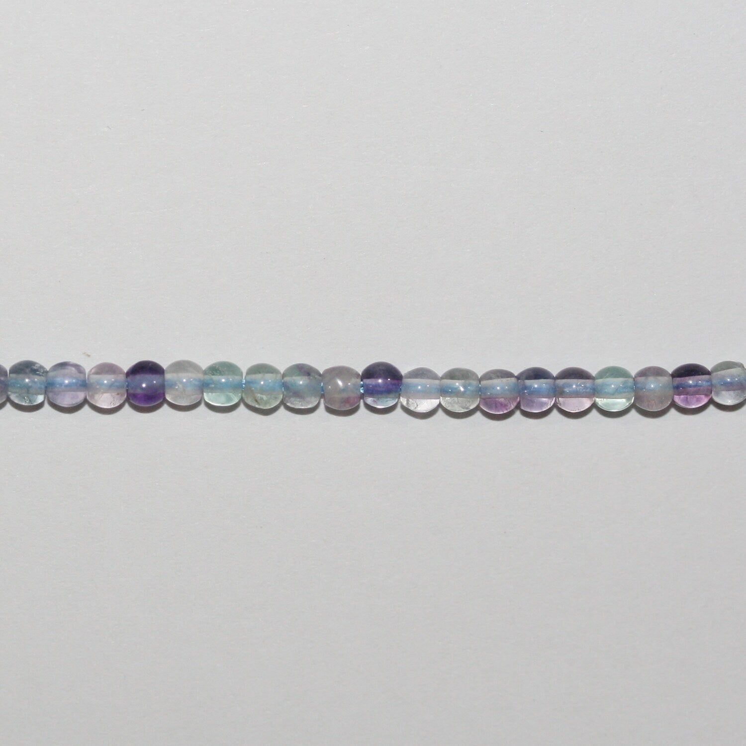 Perles rondes lisses en fluorite St 15" 2,5-3 mm.-Rig 39 cm.