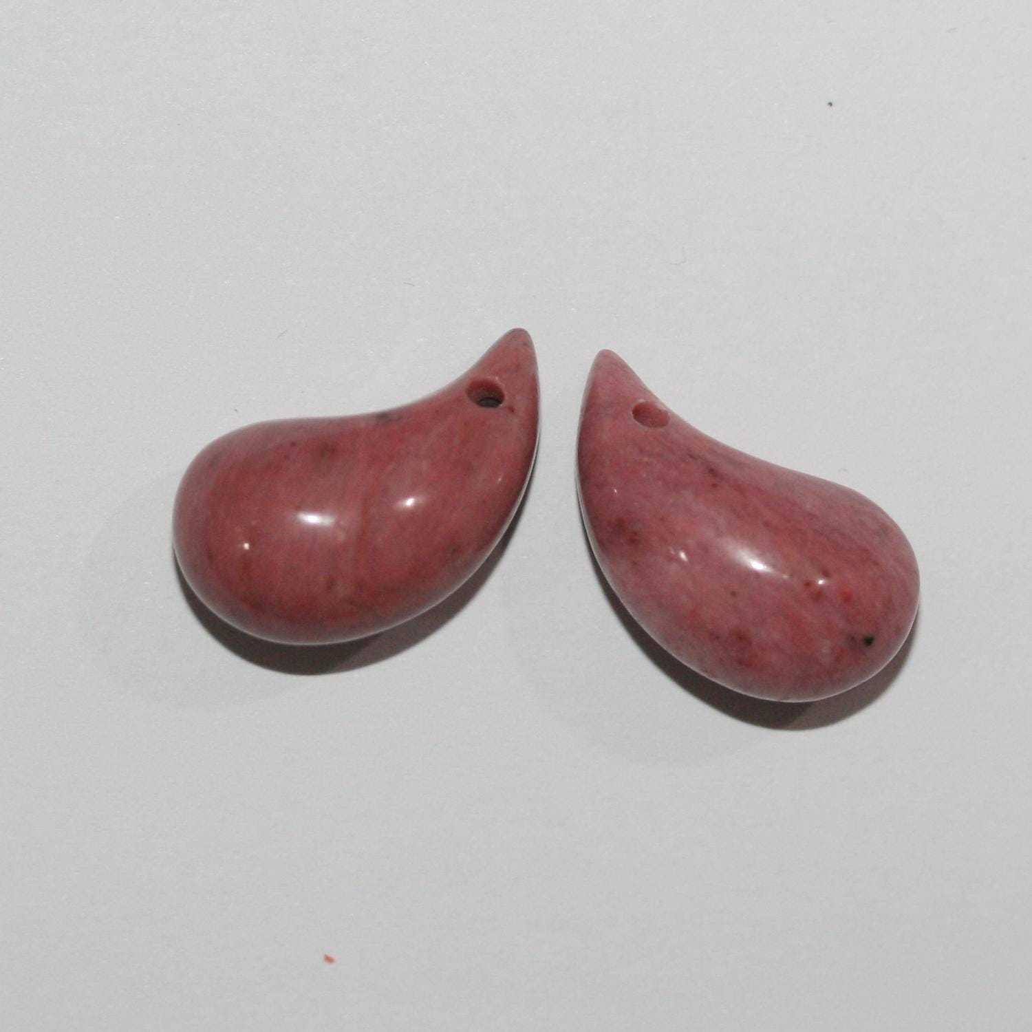 Pendentif en rhodonite lisse en forme de défense 20x10mm.( 1 paire )