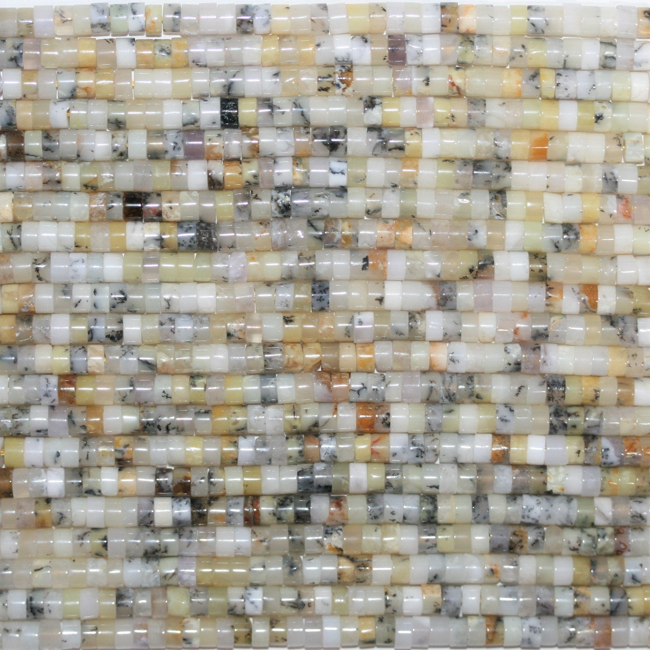 Perles disques lisses en opale colorée 15" 4x2mm.- Brin 39cm.