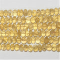 Perles rondelles graduées à facettes en béryl jaune 5x3-10x7mm. Longueur approximative du fil : 40 cm.