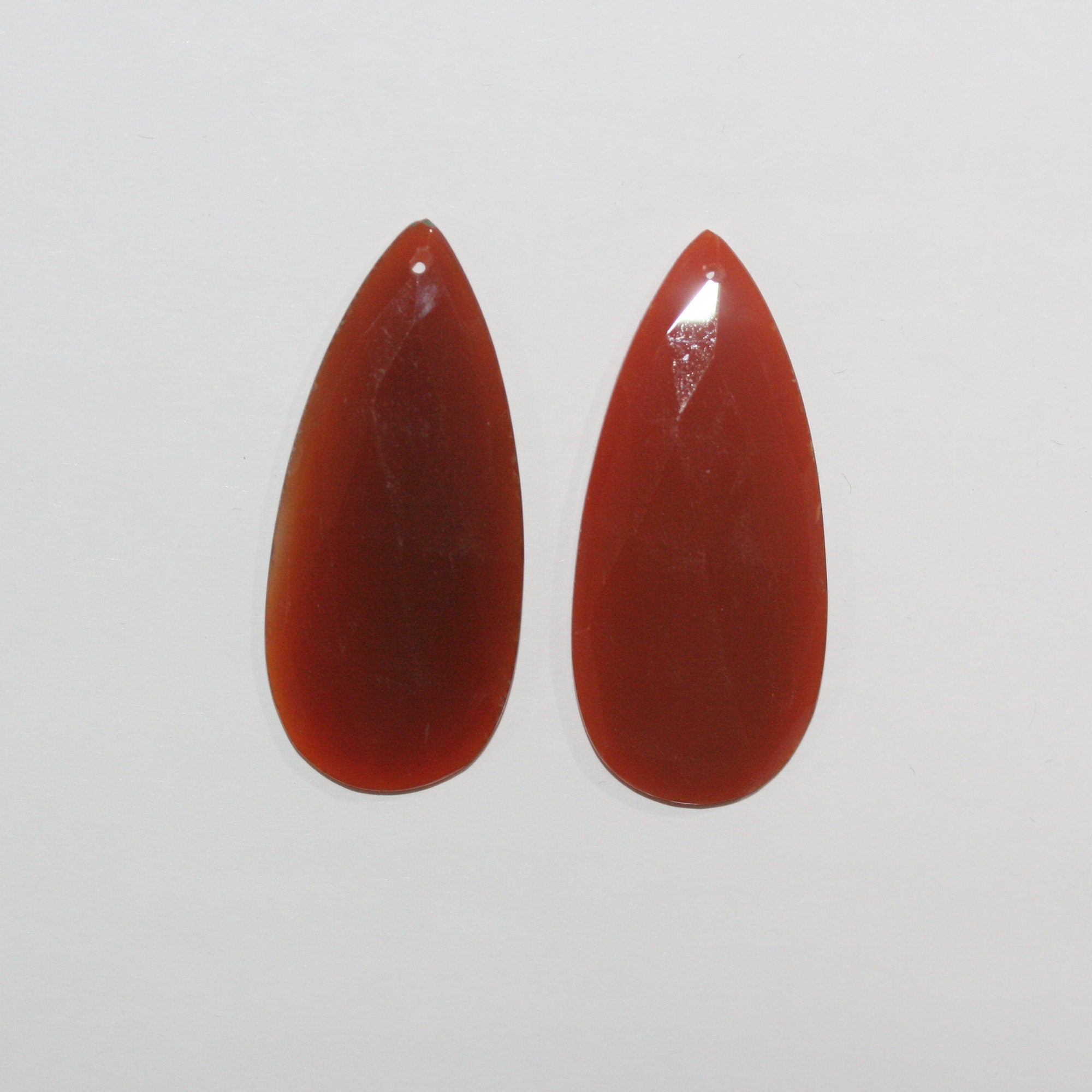 Colgantes de gota facetada de calcedonia naranja de 45 x 25 mm (1 par)