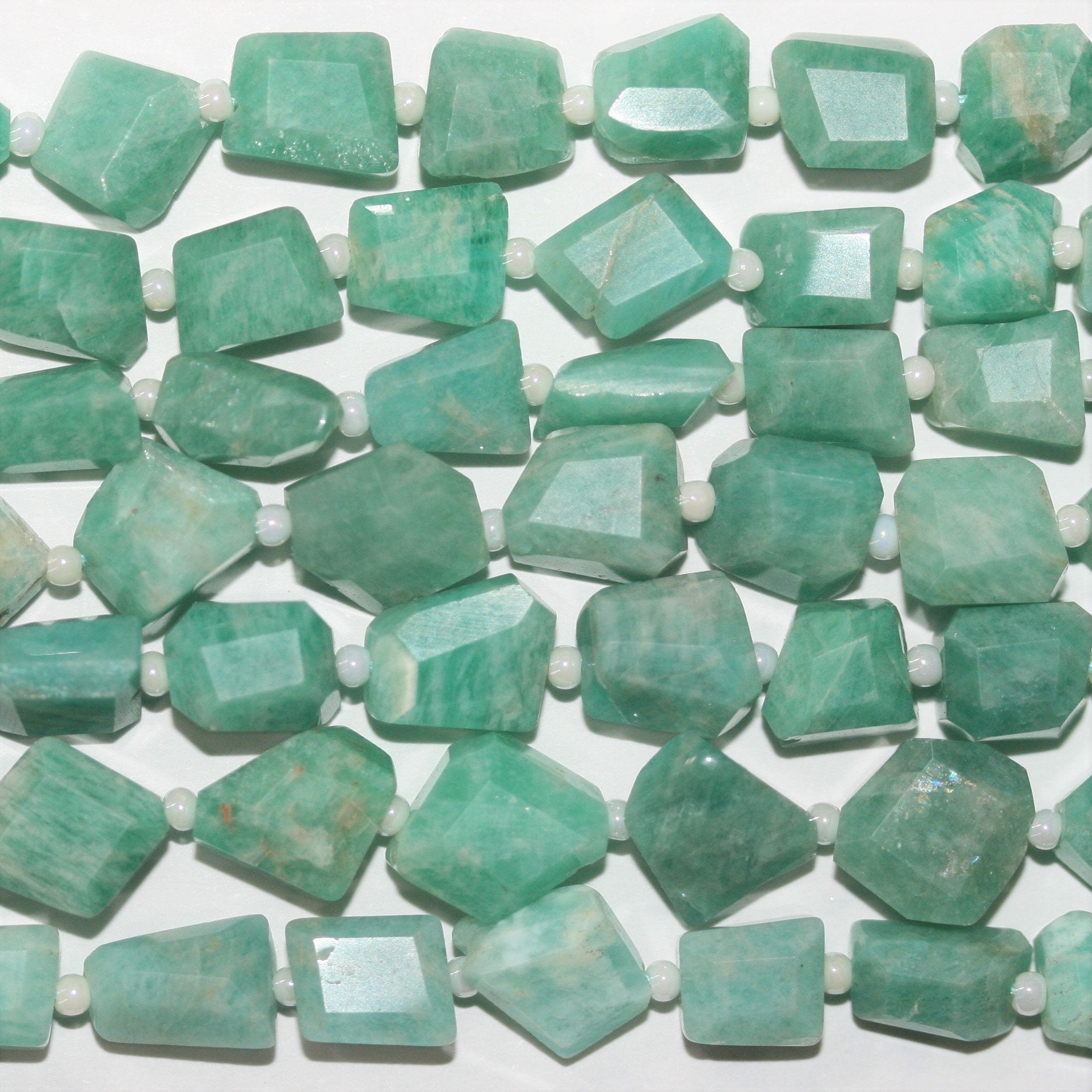 14" St Amazonite Faceted Nugget 8x6mm.Approx.-Strand 35cm.