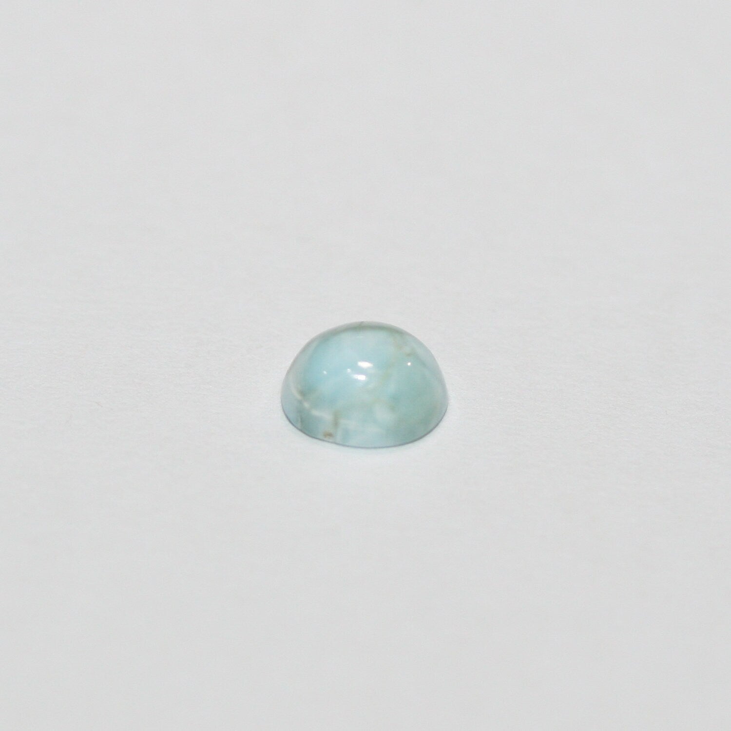 Lote de 20 cabujones ovalados de Larimar de 6 x 4 mm. (20 uds.).