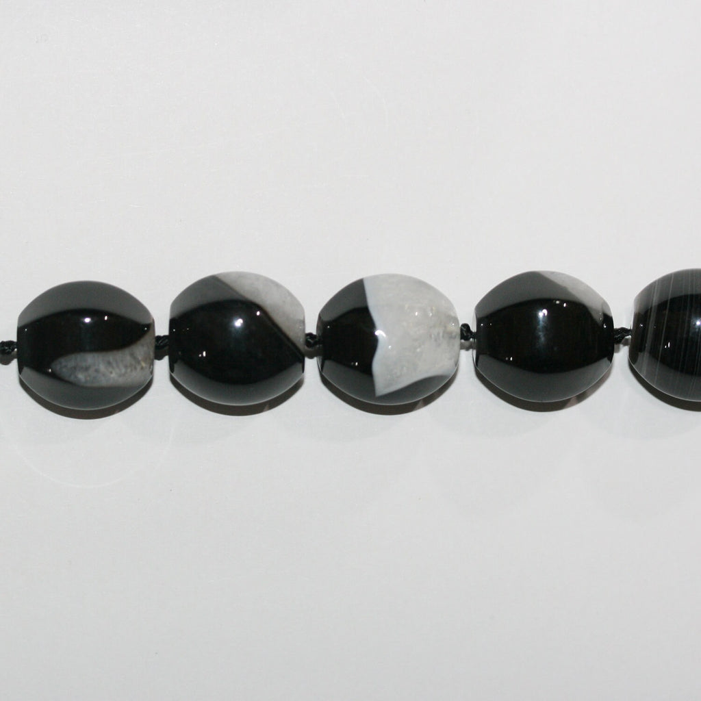 Cuentas de barril facetadas de ónix en bandas de 16" de 19 x 16 mm, hilo de 40 cm.